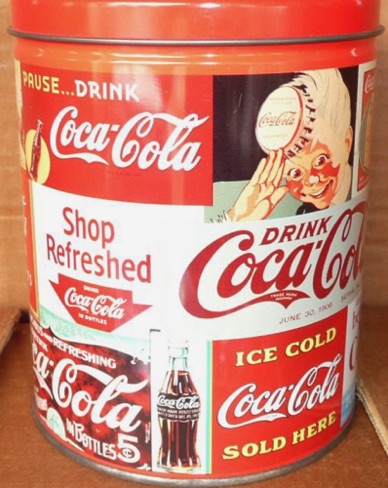 2533-1 € 7,50 coca cola blik met puzzel 700 stukjes  er ontbreken 2 stukjes